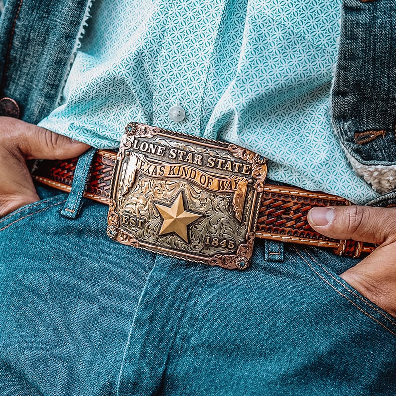 A western custom belt buckle fashioned by a man